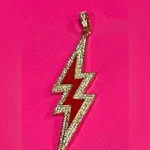 NWT Large Lightening Bolt Pendant. Has stones around the edging and the bale.